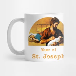 St. Joseph holds baby Jesus while Our Lady sleeps. Year of St. Joseph. Mug